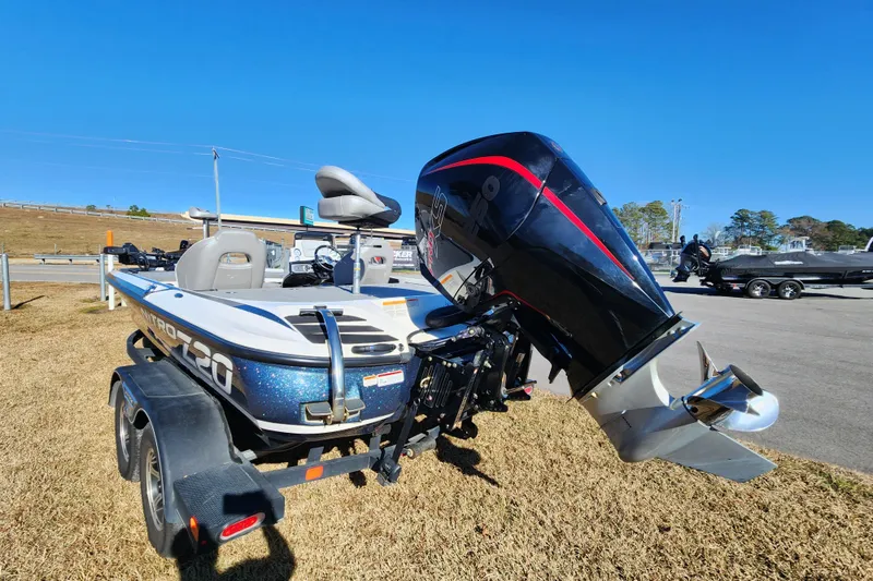 Slide: The Image of 2023 Nitro Z20 boat with powerful outboard motor on a trailer. - 5