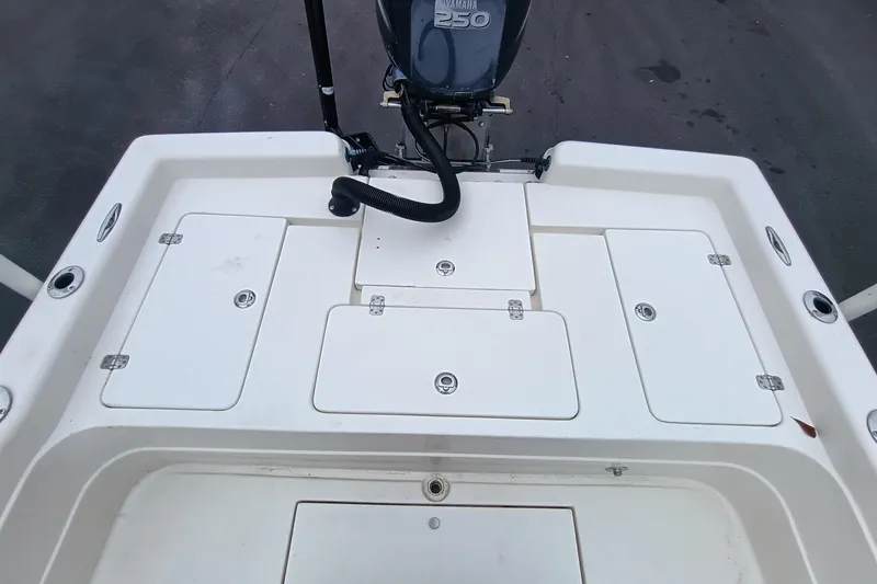 Slide: The Image of Rear view of a 2006 ShearWater Z2200 boat with Yamaha 250 engine. - 58