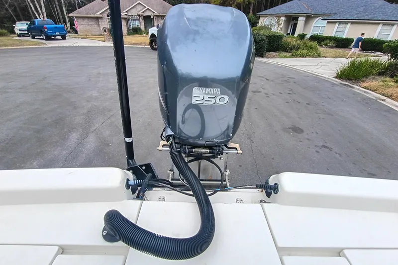 Slide: The Image of 2006 ShearWater Z2200 boat with Yamaha 250 outboard motor in residential area. - 59