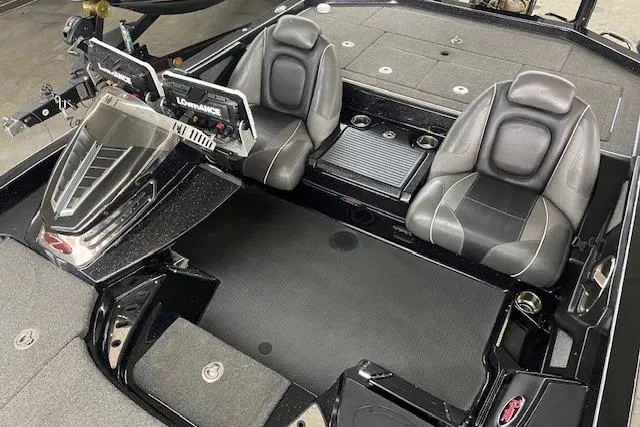 Slide: The Image of 2019 Ranger Z520C Carbon Comanche boat interior with dual seats and navigation equipment. - 6