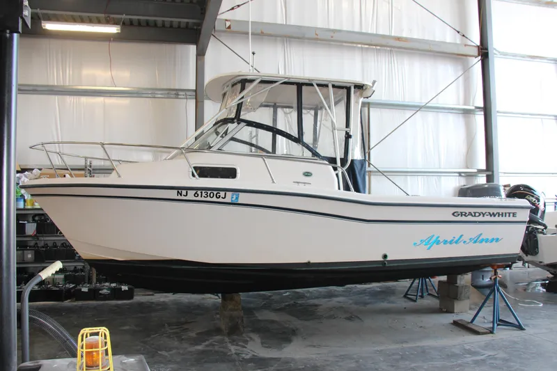 The Image of 2000 Grady-White Adventure 208 boat in storage, side view. - 0