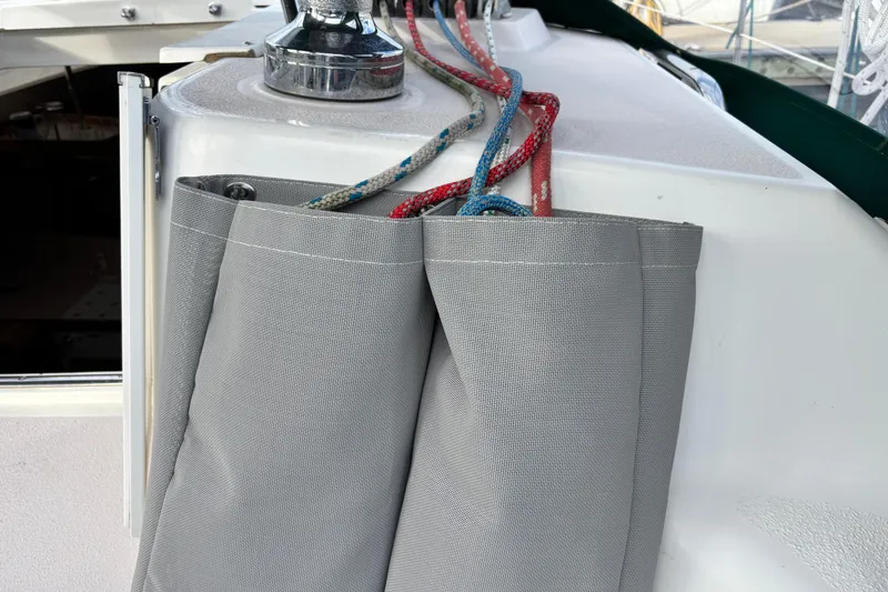 Slide: The Image of Gray sail cover and ropes on 1999 Catalina 380 yacht deck. - 5