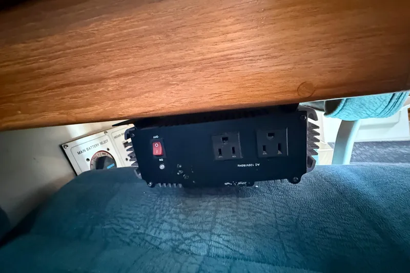 Slide: The Image of Power inverter under wooden shelf in 1999 Catalina 380 boat interior. - 50
