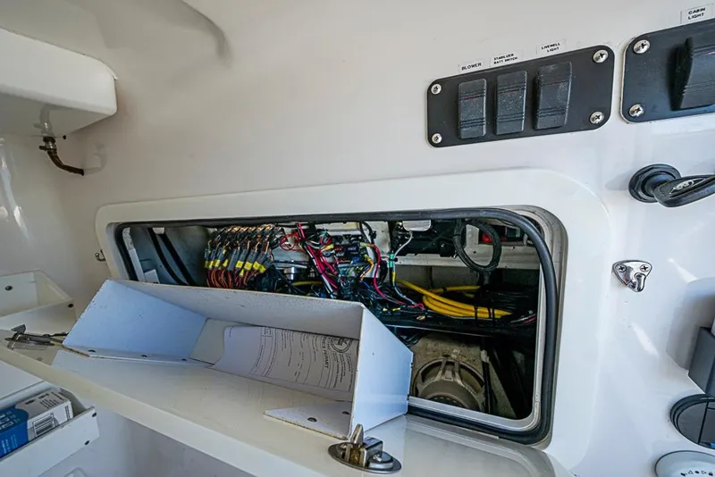 Slide: The Image of Electrical panel and wiring inside a 2011 Yellowfin 39 Offshore boat. - 29