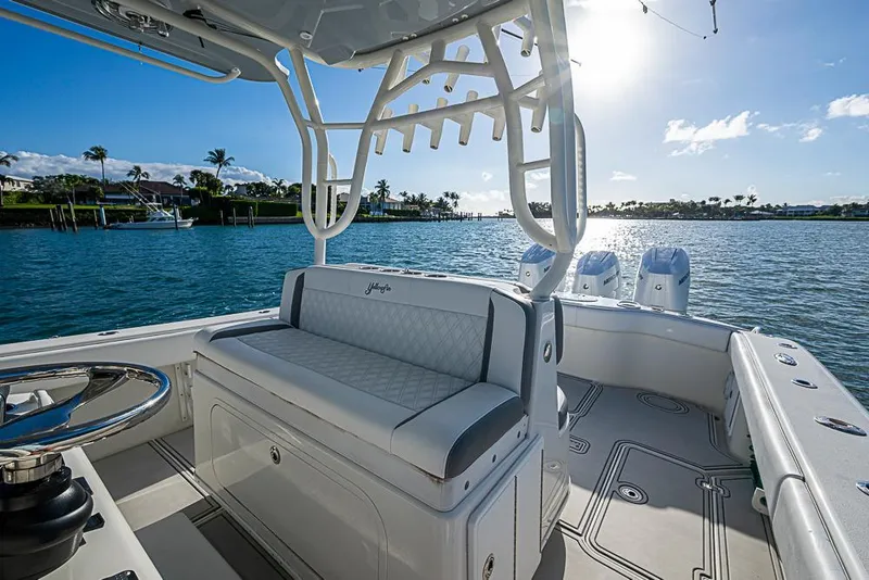 Slide: The Image of 2011 Yellowfin 39 Offshore boat interior with scenic waterfront view. - 14