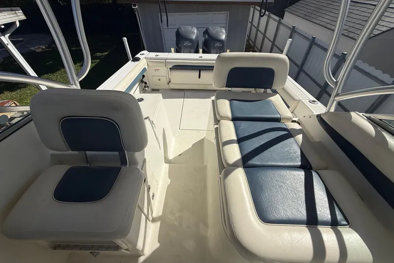 Slide: The Image of 2007 Hydra-Sports Vector 2900 VX boat interior with cushioned seating and dual engines. - 101