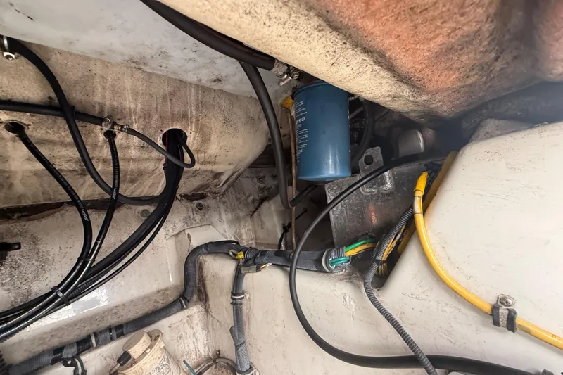 Slide: The Image of 2007 Hydra-Sports Vector 2900 VX engine compartment with visible wiring and components. - 102