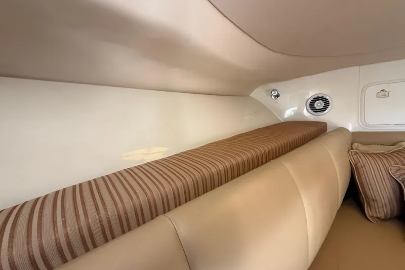 Slide: The Image of Interior of 2007 Hydra-Sports Vector 2900 VX with striped cushions and beige seating. - 107