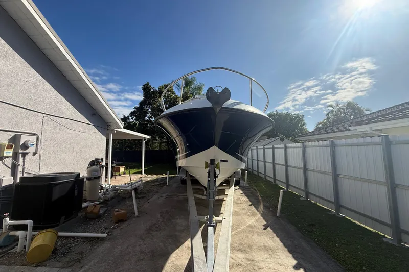 Slide: The Image of 2007 Hydra-Sports Vector 2900 VX boat on trailer, sunny day, residential setting. - 11