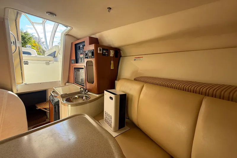 Slide: The Image of 2007 Hydra-Sports Vector 2900 VX cabin interior with kitchenette and seating area. - 116