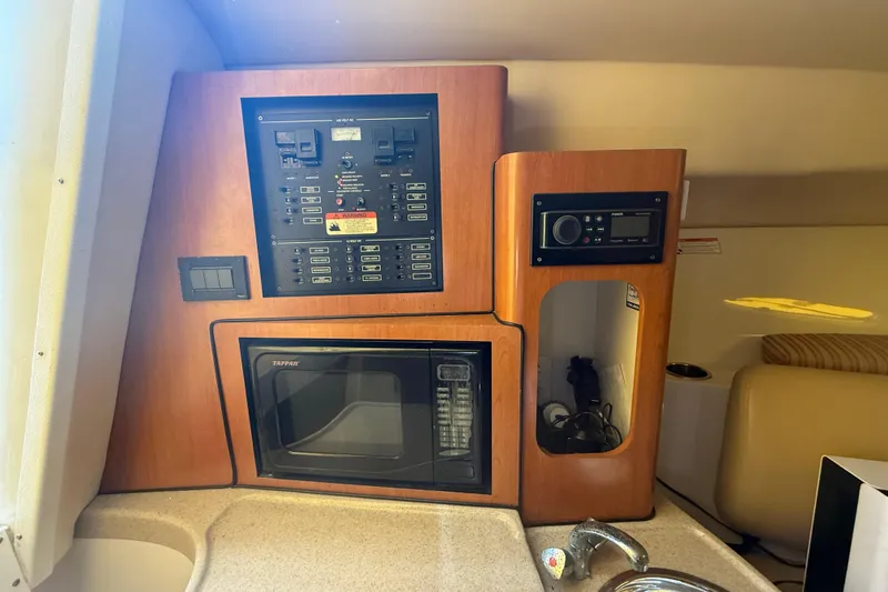 Slide: The Image of 2007 Hydra-Sports Vector 2900 VX interior with control panel, microwave, and radio. - 122