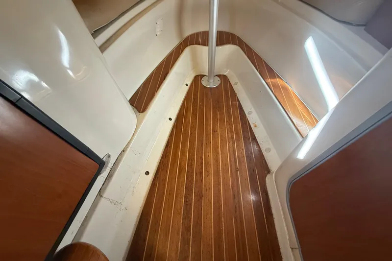 Slide: The Image of 2007 Hydra-Sports Vector 2900 VX cabin interior with wooden flooring and sleek design. - 130