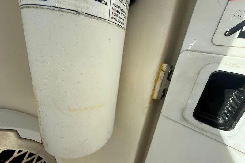 Slide: The Image of 2007 Hydra-Sports Vector 2900 VX boat interior detail with fire extinguisher and control panel. - 137