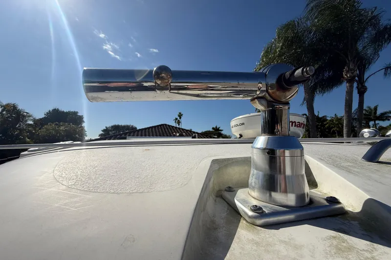 Slide: The Image of 2007 Hydra-Sports Vector 2900 VX boat with a mounted metal rod holder under clear blue sky. - 140