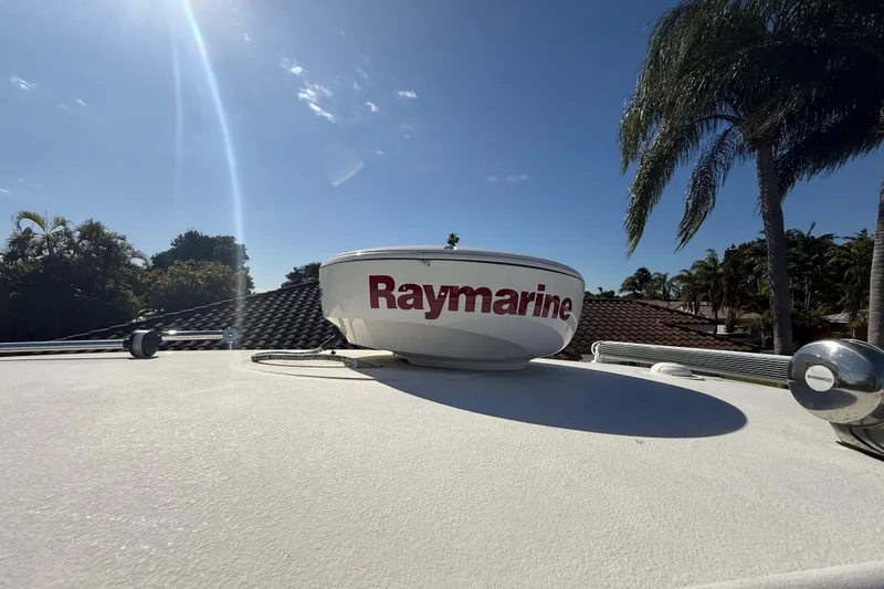 Slide: The Image of 2007 Hydra-Sports Vector 2900 VX with Raymarine radar under clear blue sky. - 145