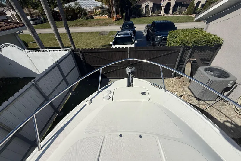 Slide: The Image of 2007 Hydra-Sports Vector 2900 VX boat parked in a residential driveway. - 148