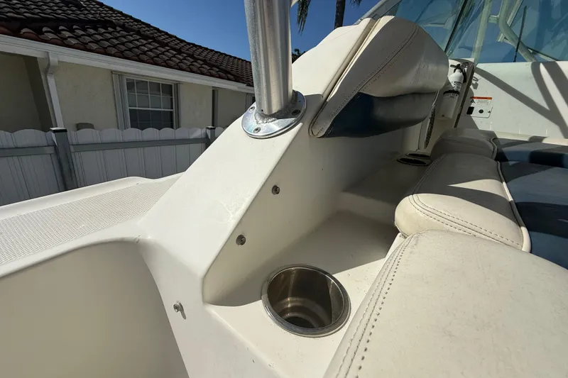 Slide: The Image of 2007 Hydra-Sports Vector 2900 VX boat interior with seating and cup holder. - 172