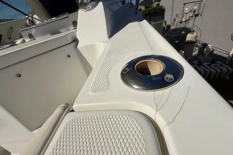 Slide: The Image of 2007 Hydra-Sports Vector 2900 VX boat deck with rod holder and textured surface. - 175