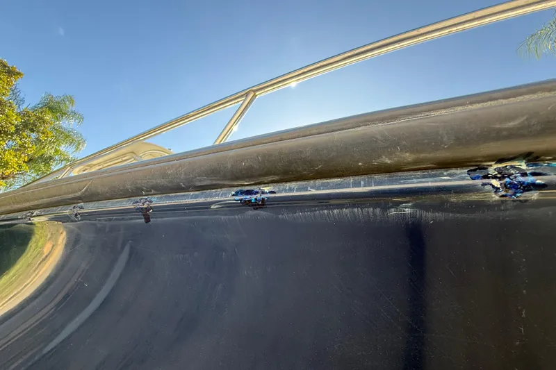 Slide: The Image of 2007 Hydra-Sports Vector 2900 VX boat hull with visible wear and scratches. - 179