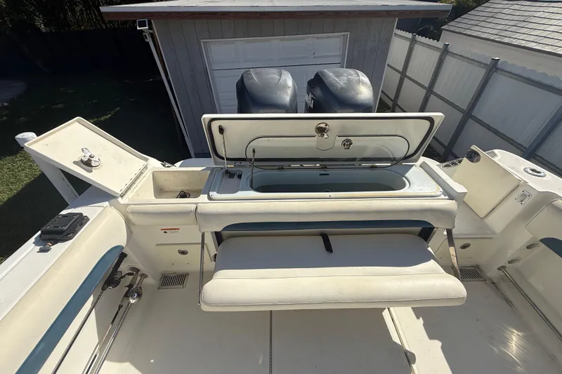 Slide: The Image of 2007 Hydra-Sports Vector 2900 VX boat interior with open storage compartments. - 71