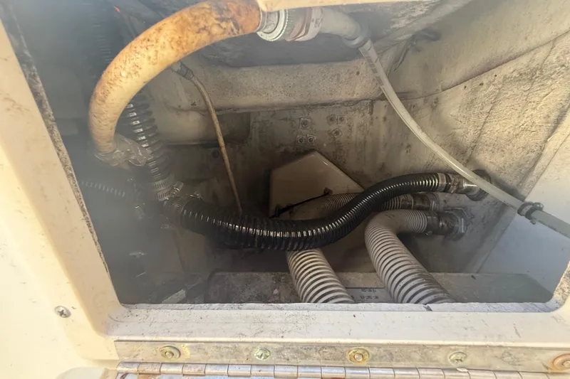 Slide: The Image of 2007 Hydra-Sports Vector 2900 VX engine compartment with hoses and wiring. - 74