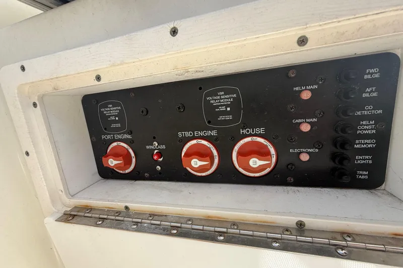Slide: The Image of Control panel of a 2007 Hydra-Sports Vector 2900 VX boat with engine and electronics switches. - 77