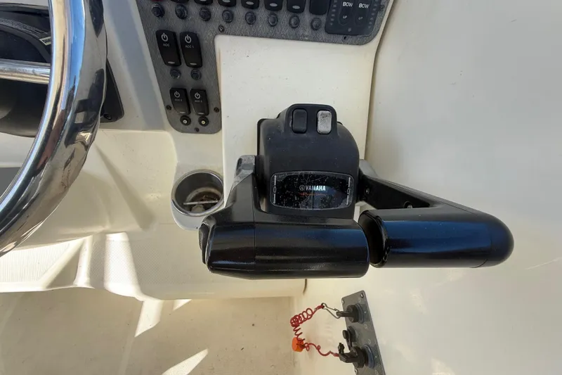 Slide: The Image of 2007 Hydra-Sports Vector 2900 VX boat controls with Yamaha throttle and steering wheel. - 81