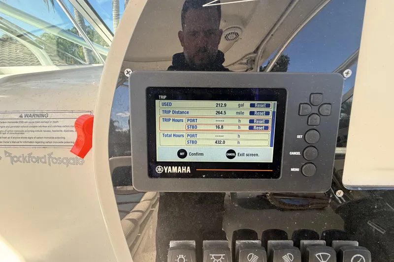 Slide: The Image of Yamaha display on 2007 Hydra-Sports Vector 2900 VX boat dashboard showing trip data. - 83