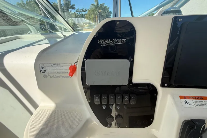Slide: The Image of 2007 Hydra-Sports Vector 2900 VX dashboard with Yamaha controls and warning labels. - 87