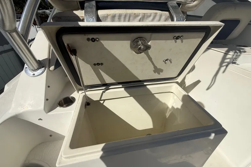 Slide: The Image of Open storage compartment on a 2007 Hydra-Sports Vector 2900 VX boat. - 94
