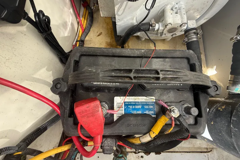 Slide: The Image of Battery compartment of 2007 Hydra-Sports Vector 2900 VX with wiring and connections visible. - 95