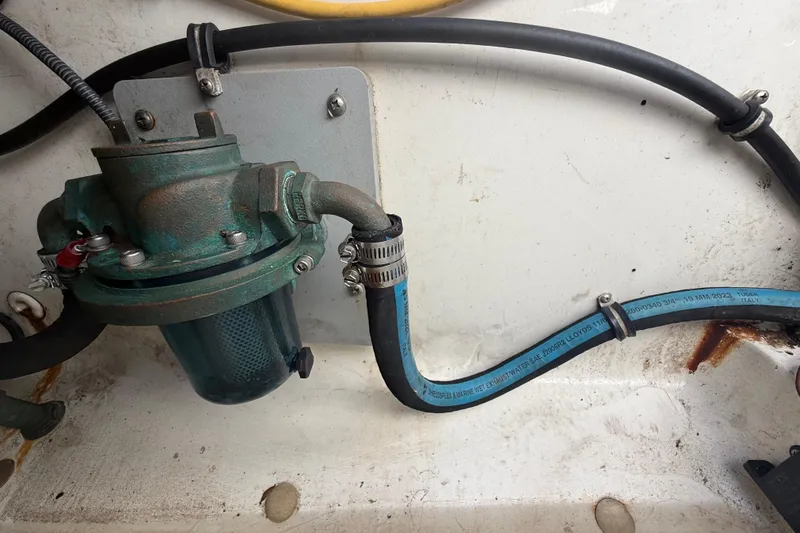 Slide: The Image of 2007 Hydra-Sports Vector 2900 VX marine engine component with hoses and clamps. - 99