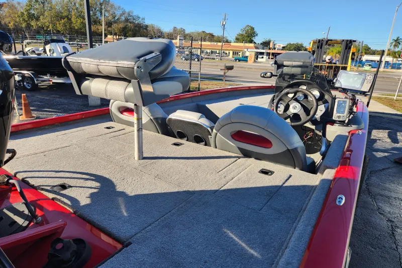 Slide: The Image of 2013 TRACKER MARINE Bass Tracker Pro Team 175 TWX boat interior with seating and controls. - 2