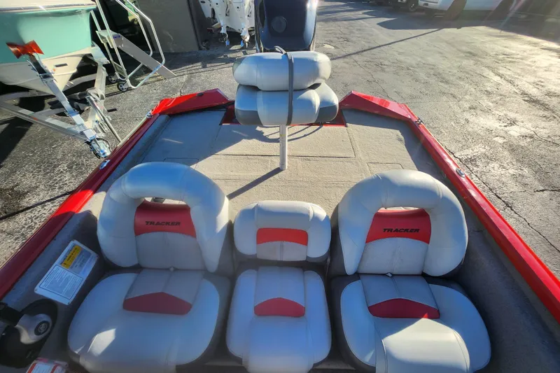 Slide: The Image of 2013 TRACKER MARINE Bass Tracker Pro Team 175 TWX boat interior with cushioned seats. - 4