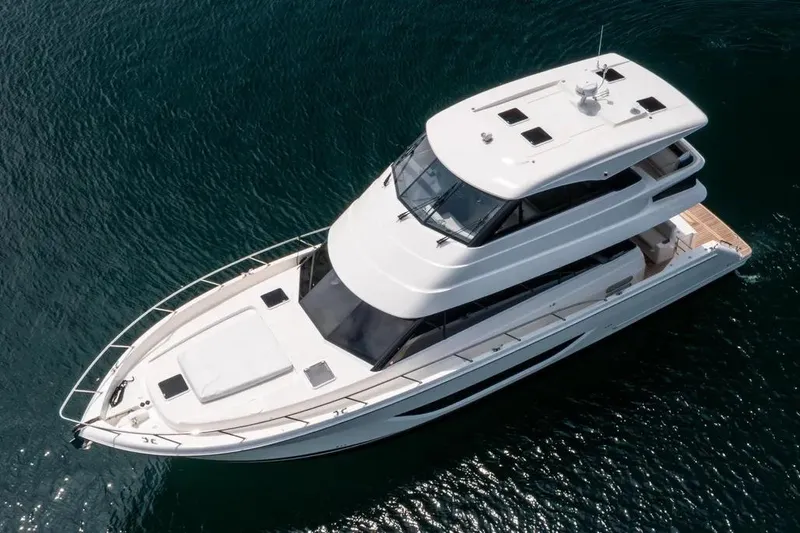 The Image of 2024 Maritimo M55 luxury yacht on calm water, aerial view. - 0