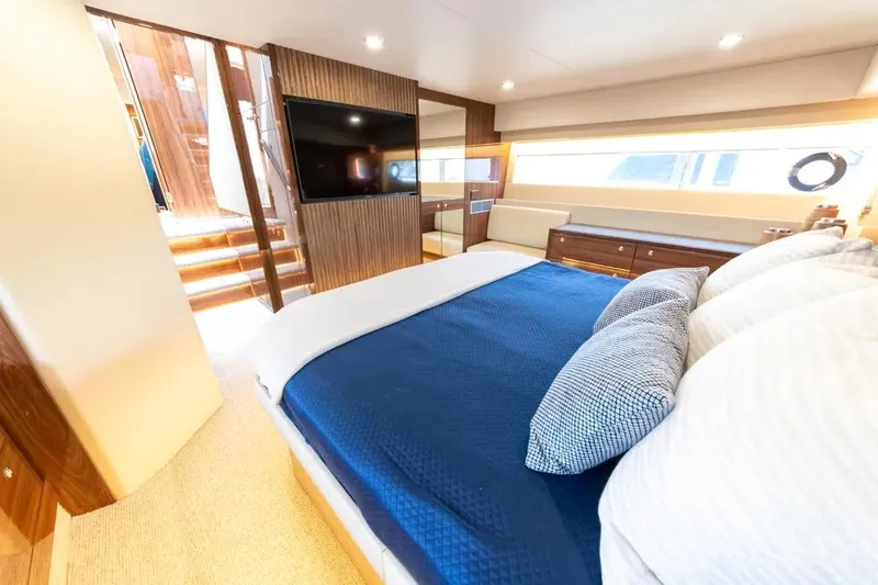 Slide: The Image of Luxurious interior of 2024 Maritimo M55 yacht with elegant bedroom design. - 21