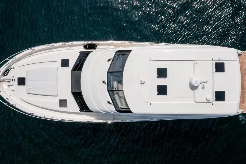 Slide: The Image of Aerial view of 2024 Maritimo M55 yacht on clear blue water. - 3