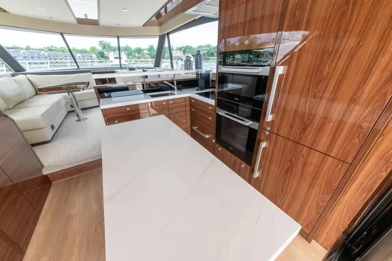 Slide: The Image of Luxurious interior of 2024 Maritimo M55 yacht with modern kitchen and seating area. - 41