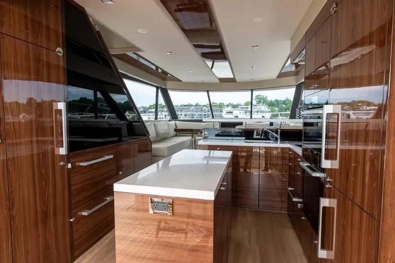 Slide: The Image of Luxurious interior of 2024 Maritimo M55 yacht with modern kitchen and panoramic windows. - 45