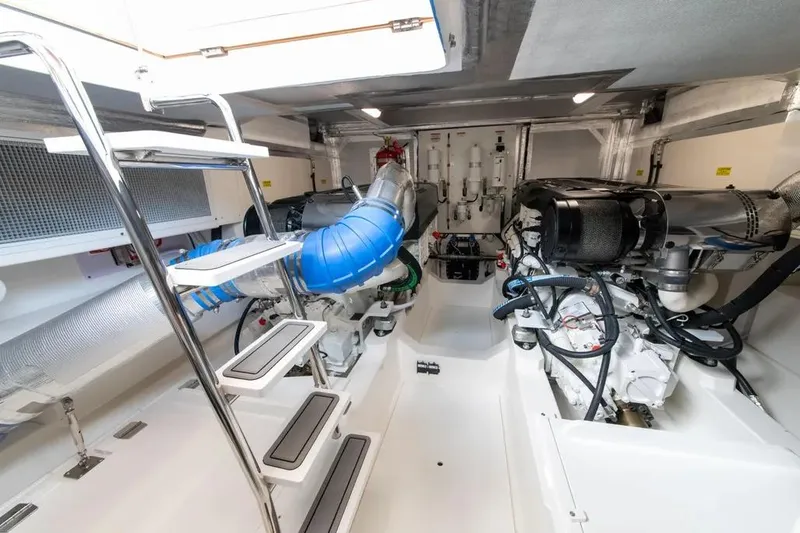 Slide: The Image of Engine room of 2024 Maritimo M55 yacht, featuring advanced machinery and sleek design. - 53