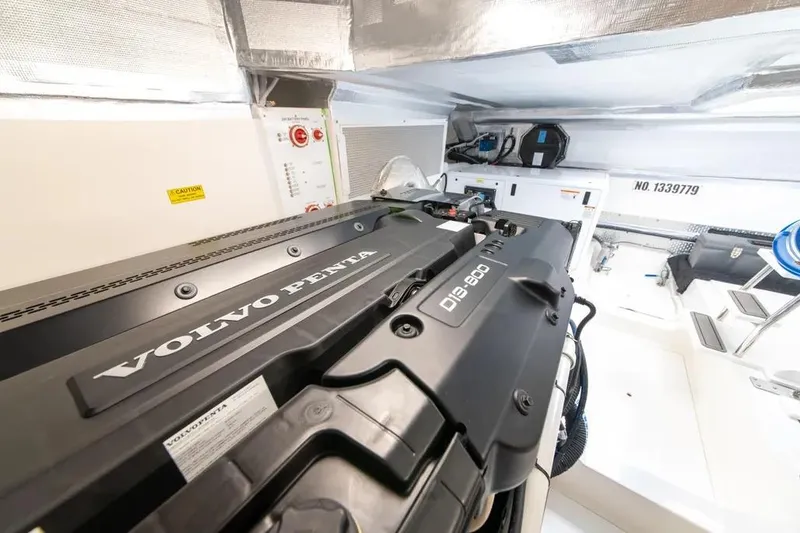 Slide: The Image of Engine room of 2024 Maritimo M55 yacht featuring Volvo Penta D13-800 engine. - 55