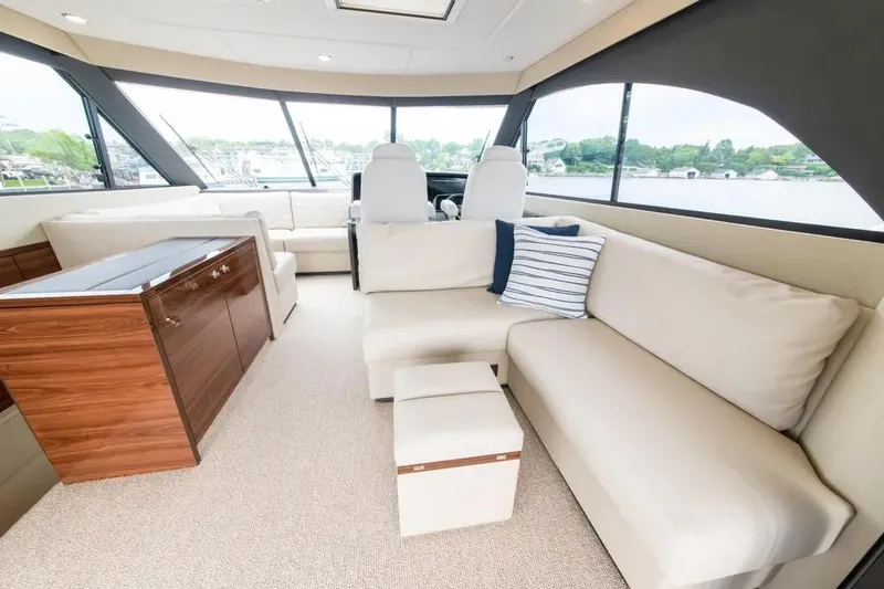 Slide: The Image of Luxurious interior of 2024 Maritimo M55 yacht with elegant seating and panoramic windows. - 62