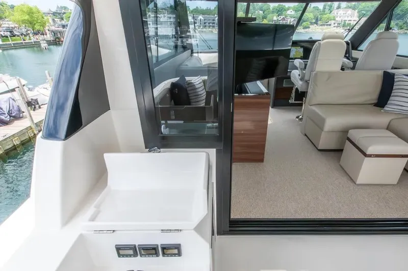 Slide: The Image of 2024 Maritimo M55 yacht interior with luxurious seating and modern design. - 81