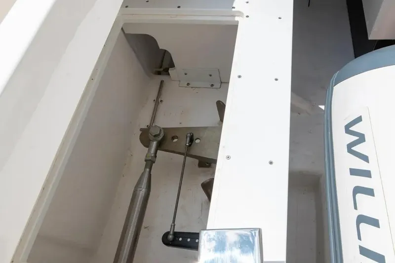 Slide: The Image of 2024 Maritimo M55 yacht engine compartment with visible mechanical components. - 91