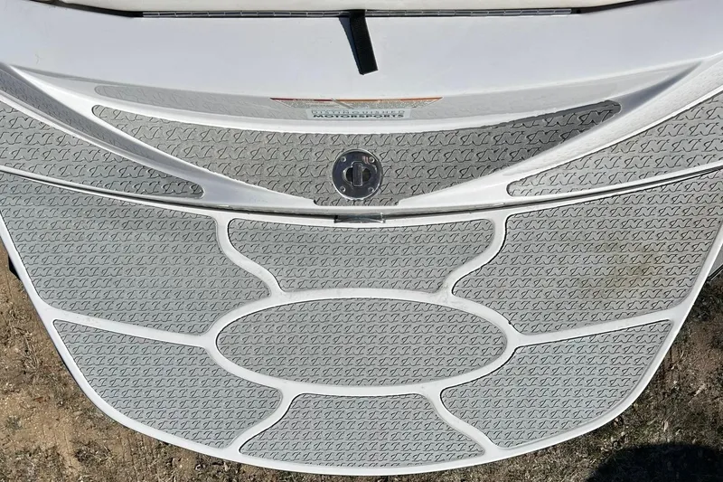 Slide: The Image of 2007 Nautique Super Air Nautique 220 boat deck with textured surface design. - 23