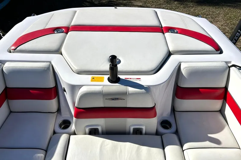 Slide: The Image of 2007 Nautique Super Air Nautique 220 boat interior with white and red seating. - 31