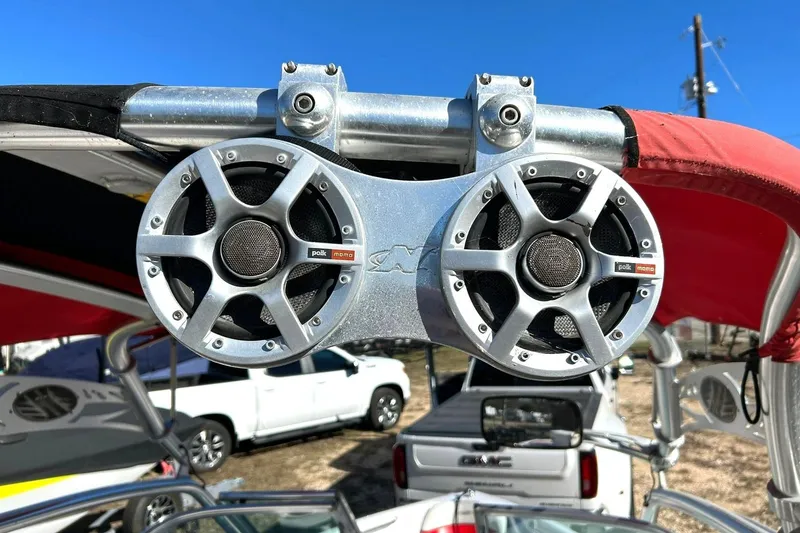 Slide: The Image of 2007 Nautique Super Air Nautique 220 with Polk audio speakers on a sunny day. - 48