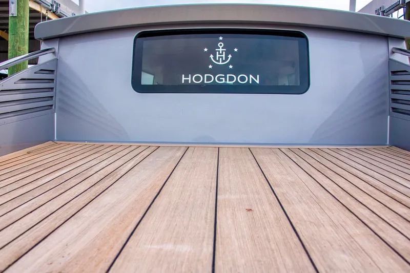 Slide: The Image of Hodgdon Venetian 2016 boat deck with wooden flooring and branded window. - 10