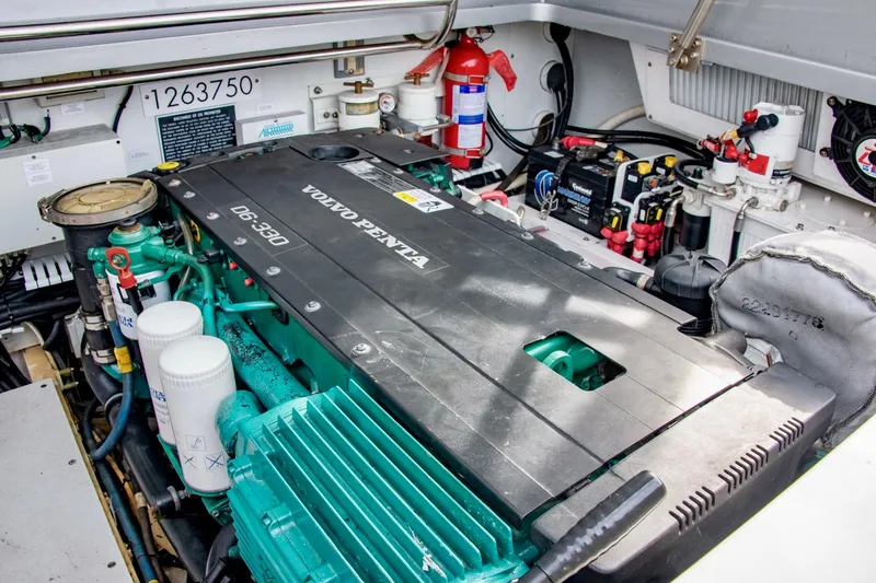 Slide: The Image of Engine compartment of 2016 Hodgdon Venetian boat featuring Volvo Penta D6-370 engine. - 11