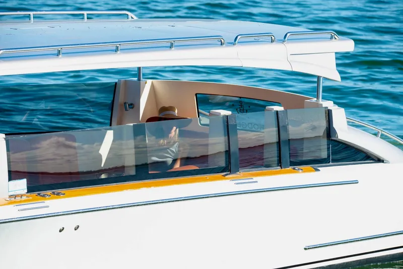 Slide: The Image of Luxury Hodgdon Venetian yacht cruising on blue water, 2016 model. - 7